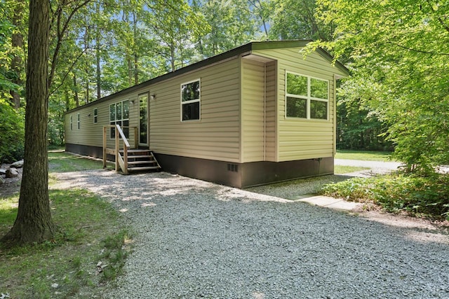 14697 Bodman Rd, Sterling Twp, OH 45154 - view of property exterior with crawl space