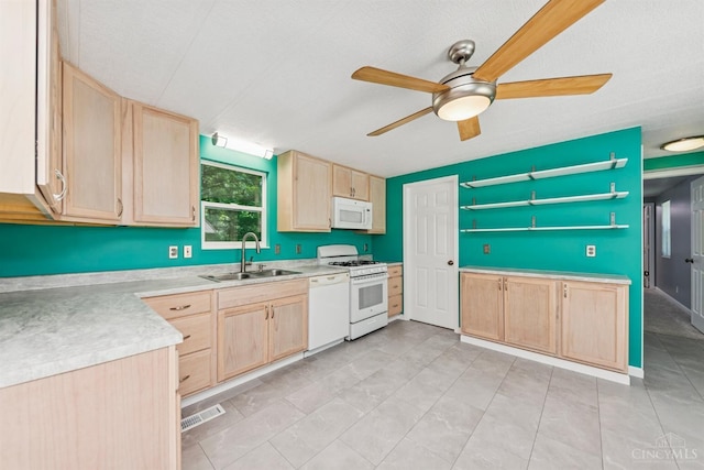 14697 Bodman Rd, Sterling Twp, OH 45154 - kitchen featuring light brown cabinets, white appliances, a ceiling fan, and light countertops