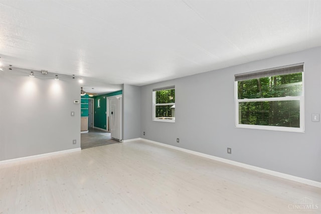 14697 Bodman Rd, Sterling Twp, OH 45154 - empty room with light wood-type flooring and ceiling fan
