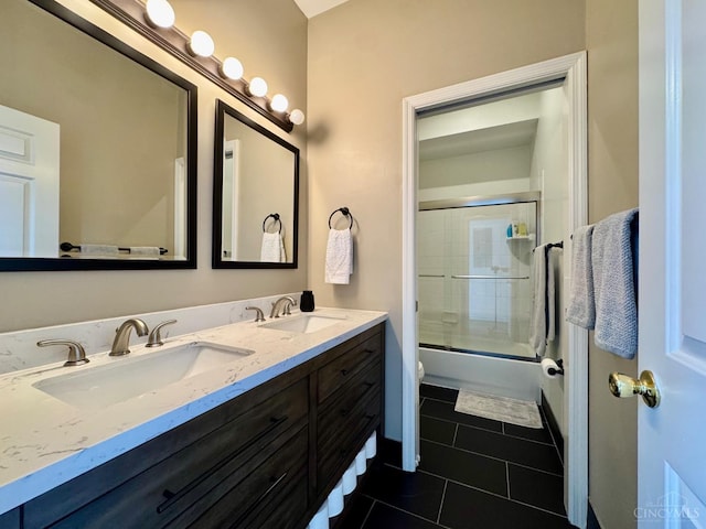 955 Pavilion St Unit 4, Cincinnati, OH 45202 - full bathroom featuring tile patterned floors, double vanity, and enclosed tub / shower combo