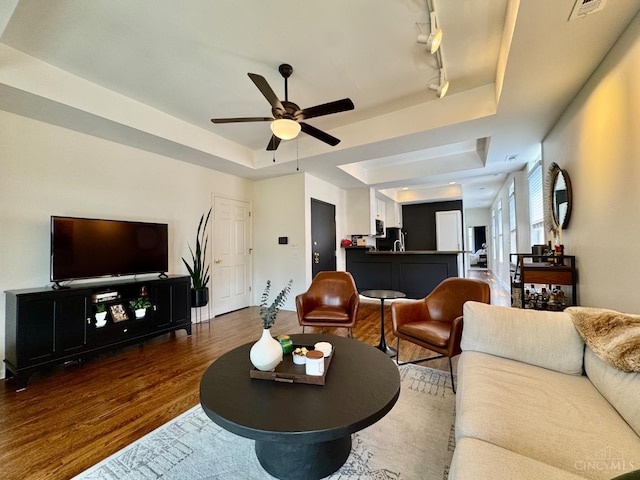 955 Pavilion St Unit 4, Cincinnati, OH 45202 - living room featuring a raised ceiling, wood finished floors, and a ceiling fan