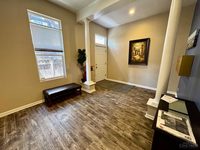 955 Pavilion St Unit 4, Cincinnati, OH 45202 - foyer entrance featuring decorative columns and dark wood-style floors