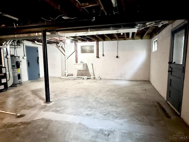 5424 Delhi Rd, Delhi Twp, OH 45238 - below grade area featuring water heater and a sink