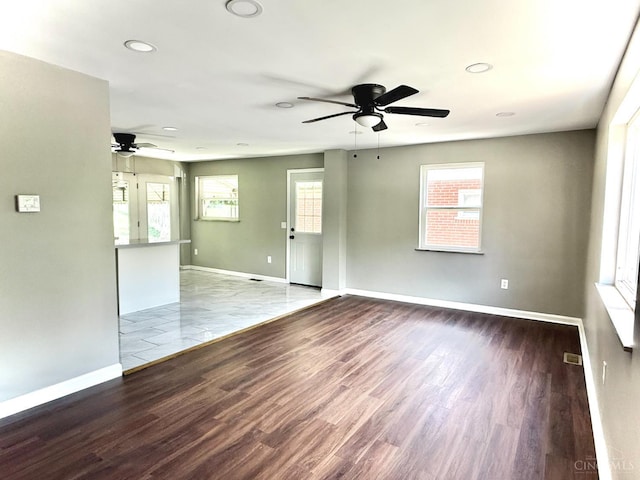 5424 Delhi Rd, Delhi Twp, OH 45238 - unfurnished room with a ceiling fan, plenty of natural light, wood finished floors, and recessed lighting