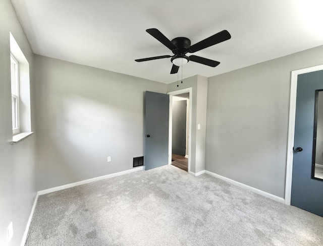 5424 Delhi Rd, Delhi Twp, OH 45238 - unfurnished bedroom featuring carpet and a ceiling fan