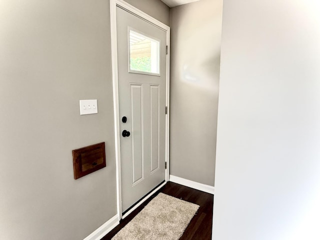5424 Delhi Rd, Delhi Twp, OH 45238 - entryway with baseboards and dark wood-type flooring