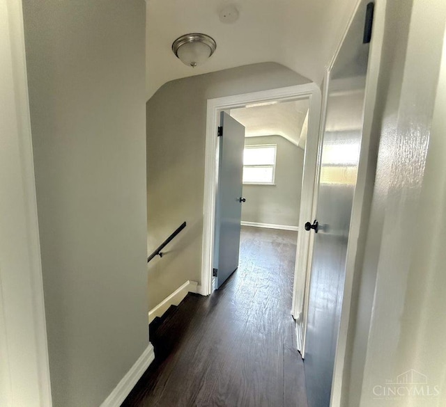 5424 Delhi Rd, Delhi Twp, OH 45238 - hallway featuring an upstairs landing, lofted ceiling, and dark wood-style floors