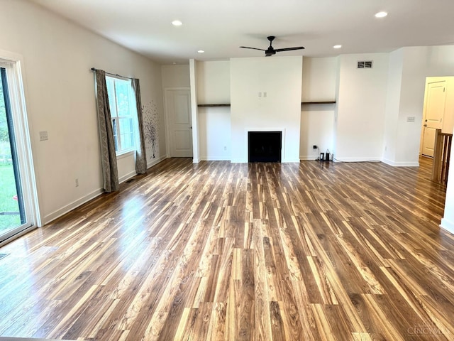 559 Foster-Maineville Rd, Hamilton Twp, OH 45039 - unfurnished living room featuring wood finished floors, a fireplace, ceiling fan, and recessed lighting
