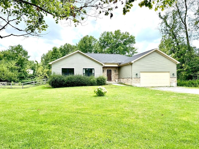 559 Foster-Maineville Rd, Hamilton Twp, OH 45039 - single story home featuring driveway, an attached garage, and stone siding