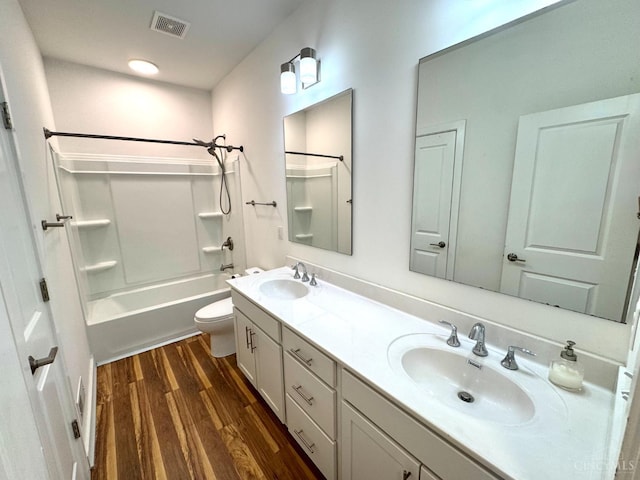 559 Foster-Maineville Rd, Hamilton Twp, OH 45039 - bathroom featuring double vanity, wood finished floors, and bathing tub / shower combination