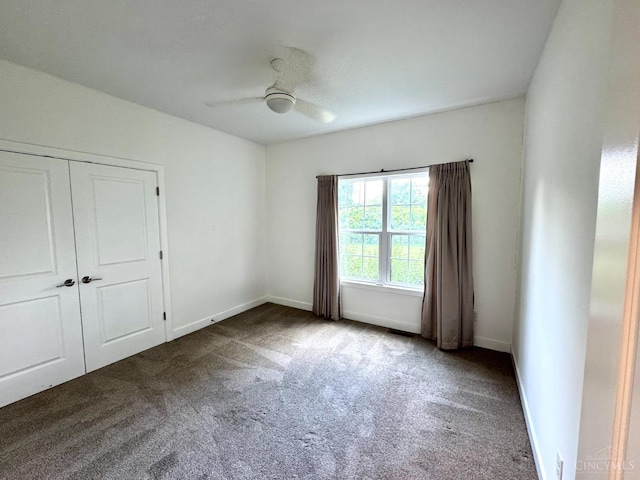 559 Foster-Maineville Rd, Hamilton Twp, OH 45039 - unfurnished bedroom featuring carpet, a ceiling fan, and a closet