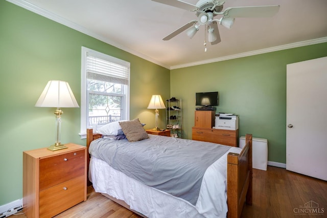 8012 Euclid Ave, Madeira, OH 45243 - bedroom with ornamental molding, wood finished floors, and ceiling fan