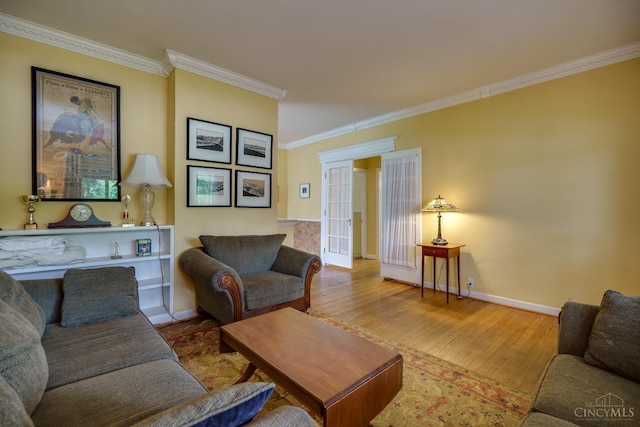 8012 Euclid Ave, Madeira, OH 45243 - living room featuring ornamental molding, wood finished floors, and french doors