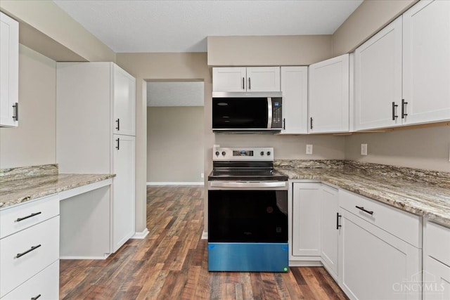 2535 Crane Schoolhouse Rd, Tate Twp, OH 45106 - kitchen with stainless steel appliances, white cabinetry, and dark wood finished floors