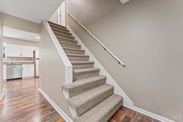 2535 Crane Schoolhouse Rd, Tate Twp, OH 45106 - stairs with wood finished floors and baseboards