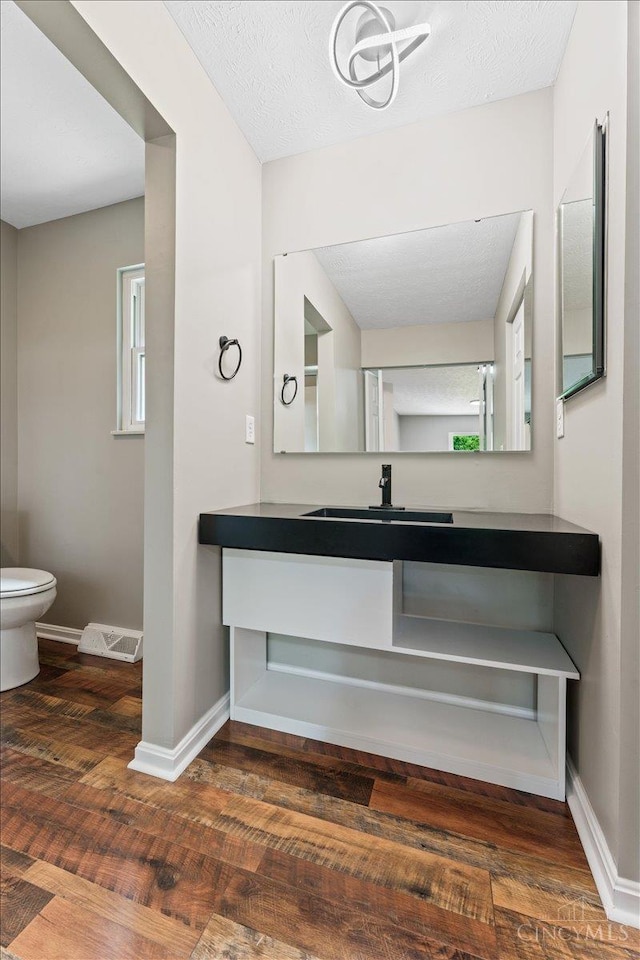 2535 Crane Schoolhouse Rd, Tate Twp, OH 45106 - bathroom featuring wood finished floors and vanity