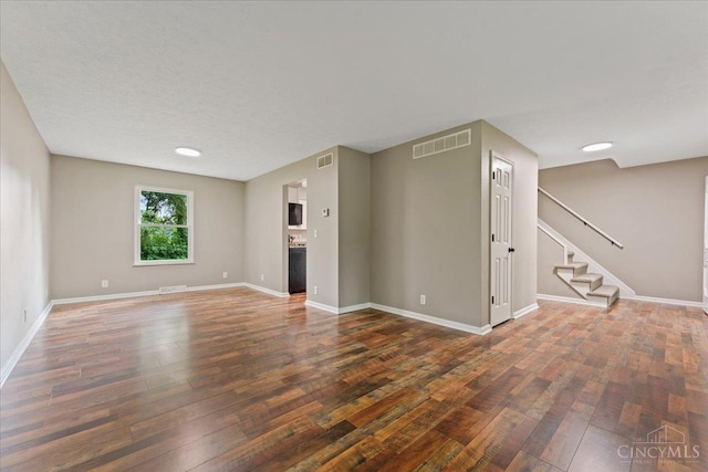 2535 Crane Schoolhouse Rd, Tate Twp, OH 45106 - unfurnished living room featuring hardwood / wood-style flooring and stairs