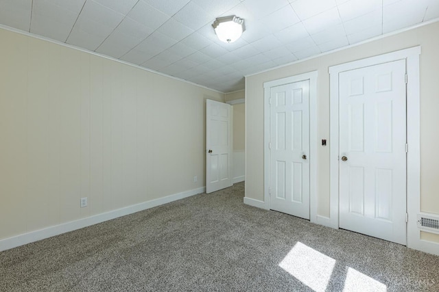 989 E Ogden Rd, Adams Twp, OH 45177 - unfurnished bedroom featuring carpet flooring and ornamental molding