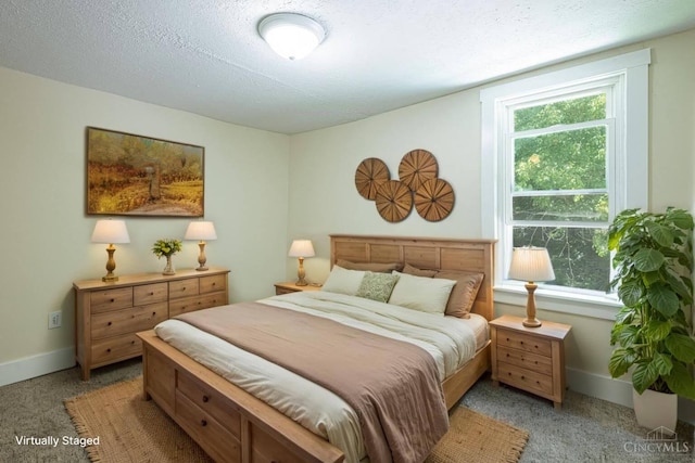 989 E Ogden Rd, Adams Twp, OH 45177 - bedroom featuring light colored carpet and a textured ceiling