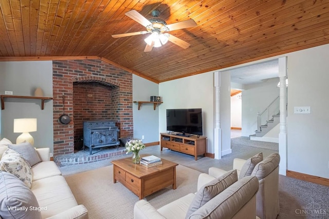 989 E Ogden Rd, Adams Twp, OH 45177 - living area with light colored carpet, wood ceiling, a wood stove, a ceiling fan, and vaulted ceiling