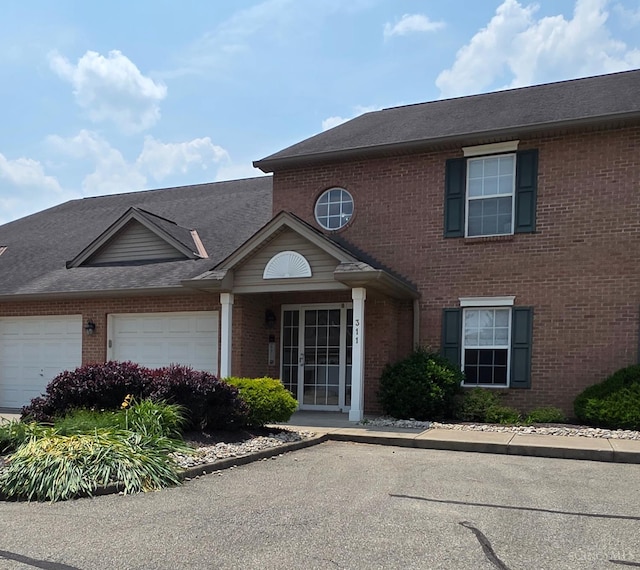 311 Miami Trce Unit 5, Harrison, OH 45030 - view of front of house featuring brick siding and an attached garage