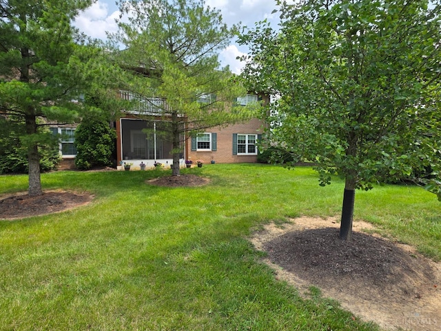 311 Miami Trce Unit 5, Harrison, OH 45030 - view of grassy yard with a sunroom