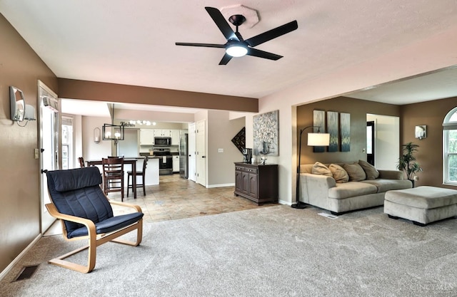 6330 Branch Hill Miamiville Rd, Miami Twp, OH 45140 - living room featuring a ceiling fan and light carpet