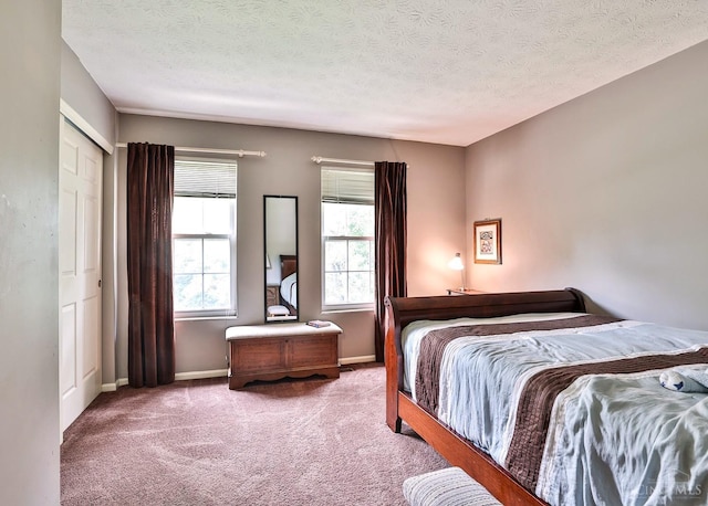 6330 Branch Hill Miamiville Rd, Miami Twp, OH 45140 - carpeted bedroom featuring a textured ceiling and a closet
