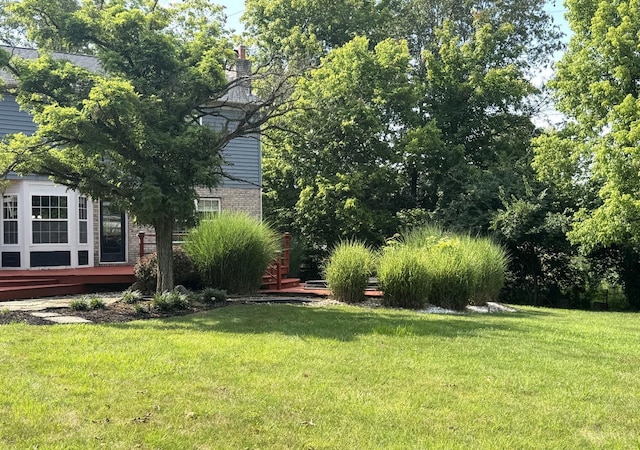 6330 Branch Hill Miamiville Rd, Miami Twp, OH 45140 - view of grassy yard with a wooden deck