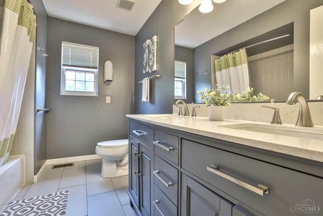 6330 Branch Hill Miamiville Rd, Miami Twp, OH 45140 - full bath with double vanity, tile patterned flooring, and shower / bath combo with shower curtain