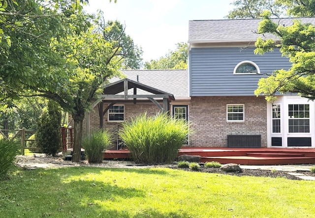 6330 Branch Hill Miamiville Rd, Miami Twp, OH 45140 - rear view of house with brick siding, a wooden deck, and roof with shingles