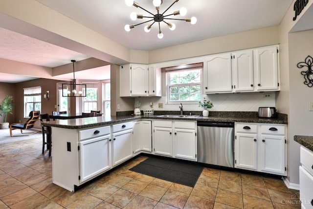 6330 Branch Hill Miamiville Rd, Miami Twp, OH 45140 - kitchen with dishwasher, a chandelier, a peninsula, white cabinetry, and hanging light fixtures