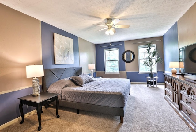 6330 Branch Hill Miamiville Rd, Miami Twp, OH 45140 - bedroom featuring carpet flooring, a textured ceiling, and a ceiling fan