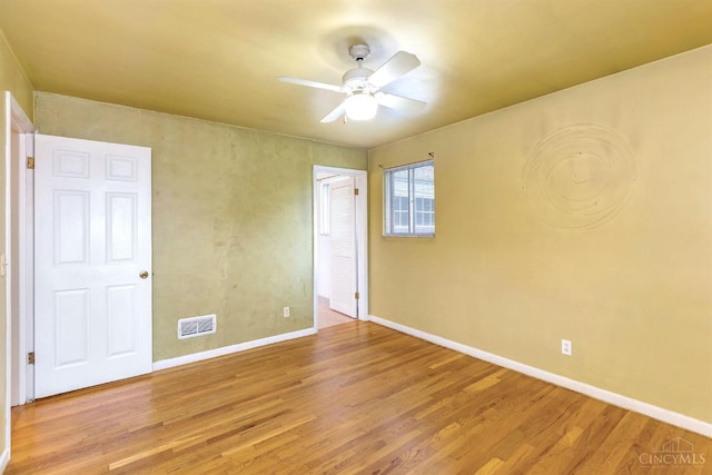 3324 Moonridge Dr, Green Twp, OH 45248 - unfurnished bedroom with wood finished floors and a ceiling fan