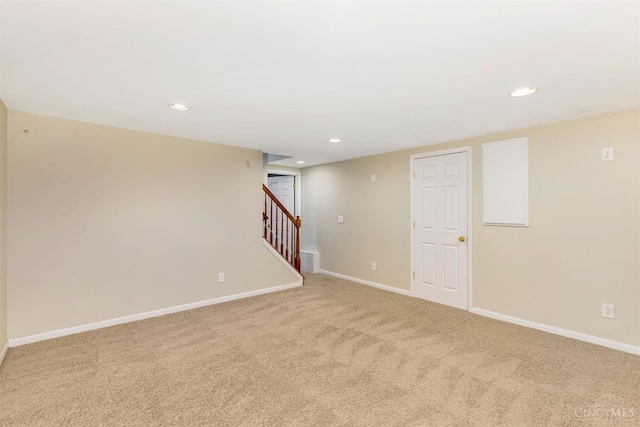 3324 Moonridge Dr, Green Twp, OH 45248 - finished below grade area featuring recessed lighting, light carpet, and stairway
