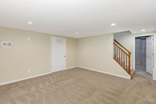3324 Moonridge Dr, Green Twp, OH 45248 - spare room featuring carpet, stairway, and recessed lighting