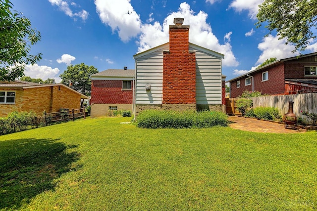 3324 Moonridge Dr, Green Twp, OH 45248 - back of property featuring a chimney
