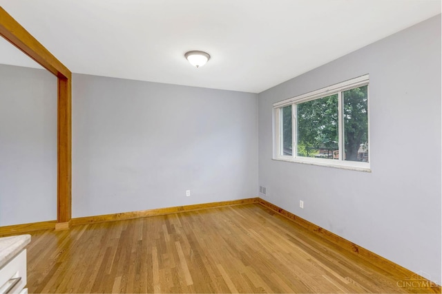 3324 Moonridge Dr, Green Twp, OH 45248 - unfurnished room with light wood-type flooring and baseboards