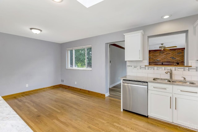 3324 Moonridge Dr, Green Twp, OH 45248 - kitchen featuring stainless steel dishwasher, ceiling fan, white cabinets, light wood-style flooring, and decorative backsplash