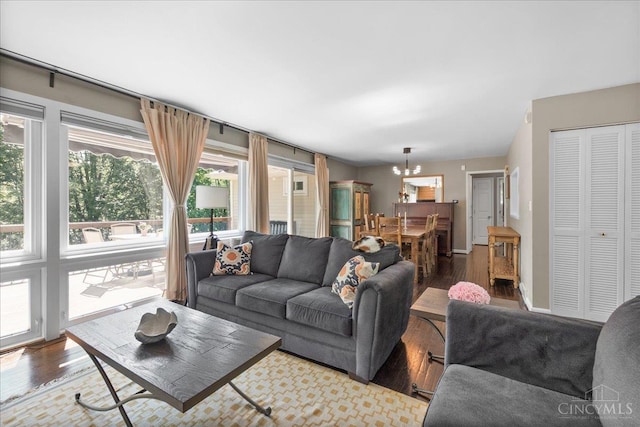 281 Compton Rd, Wyoming, OH 45215 - living area featuring wood finished floors and a chandelier