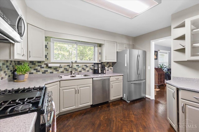 281 Compton Rd, Wyoming, OH 45215 - kitchen featuring stainless steel appliances, dark wood finished floors, backsplash, light countertops, and white cabinets