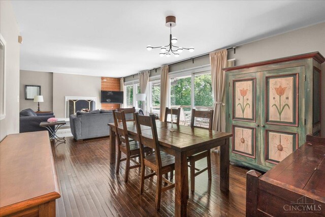 281 Compton Rd, Wyoming, OH 45215 - dining area featuring dark wood finished floors and a chandelier