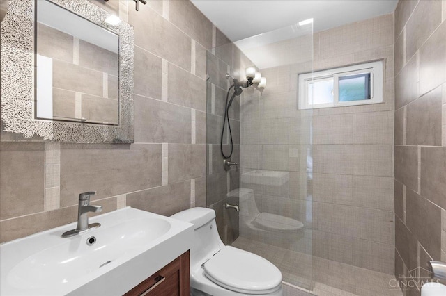 281 Compton Rd, Wyoming, OH 45215 - bathroom with tile walls, a walk in shower, and vanity