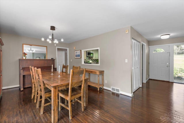 281 Compton Rd, Wyoming, OH 45215 - dining space featuring a chandelier and dark wood-type flooring