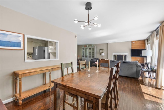 281 Compton Rd, Wyoming, OH 45215 - dining area with dark wood-style floors and a chandelier