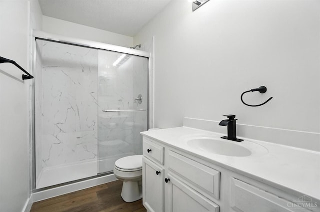 2380 Oaktree Pl, Cincinnati, OH 45238 - bathroom with a marble finish shower, wood finished floors, and vanity
