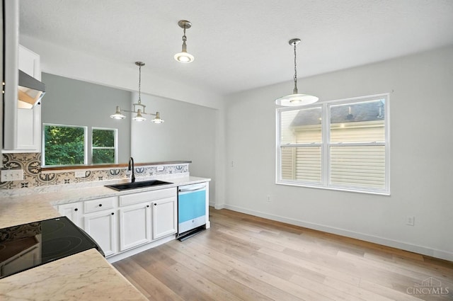 2380 Oaktree Pl, Cincinnati, OH 45238 - kitchen with dishwasher, white cabinetry, tasteful backsplash, and light wood-style flooring