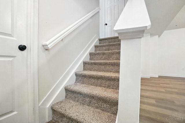 2380 Oaktree Pl, Cincinnati, OH 45238 - stairs featuring wood finished floors and baseboards