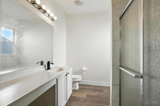2380 Oaktree Pl, Cincinnati, OH 45238 - full bath featuring vanity, wood finished floors, and a shower with door