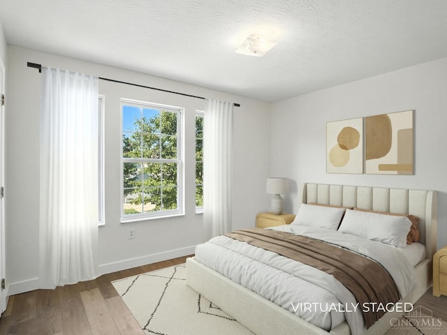 2380 Oaktree Pl, Cincinnati, OH 45238 - bedroom featuring wood finished floors and baseboards